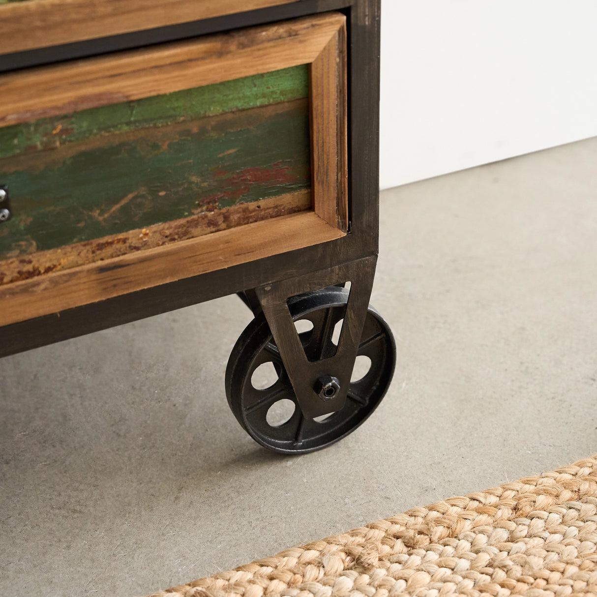 Distressed Industrial Side Table with Cast Iron Wheels